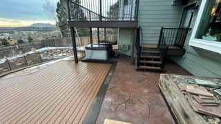 Deck and stamped concrete patio combination