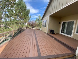 Long deck run along side of home