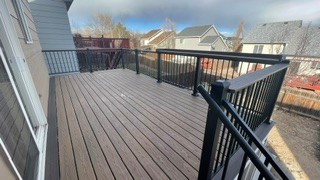 Gray composite deck with black railings