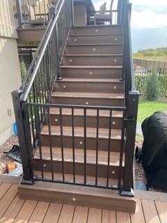 Black metal handrail and gate stair detail